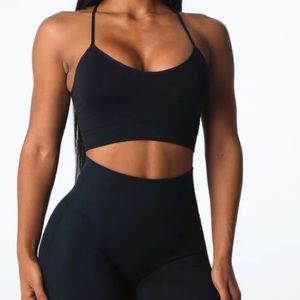 Black NVGTN cascade seamless sports bra. Size XL